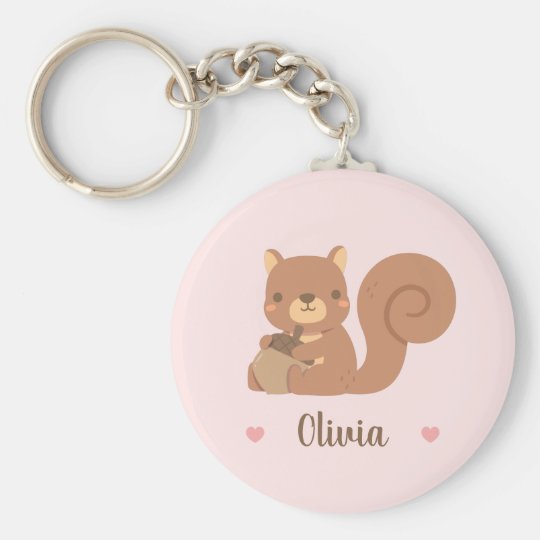 どんぐりの女の子を抱えたかわいいリスがピンク キーホルダー Zazzle Co Jp