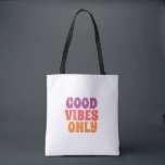 اً: Colorful Good Vibes Only Tote Bag トートバッグ<br><div class="desc">​Spread positivity with this stylish 'Good Vibes Only' tote bag. Featuring a vibrant and modern typography design in pink and orange tones,  this durable canvas bag is perfect for shopping,  school,  beach trips,  or daily errands. A great motivational gift for friends and family.</div>