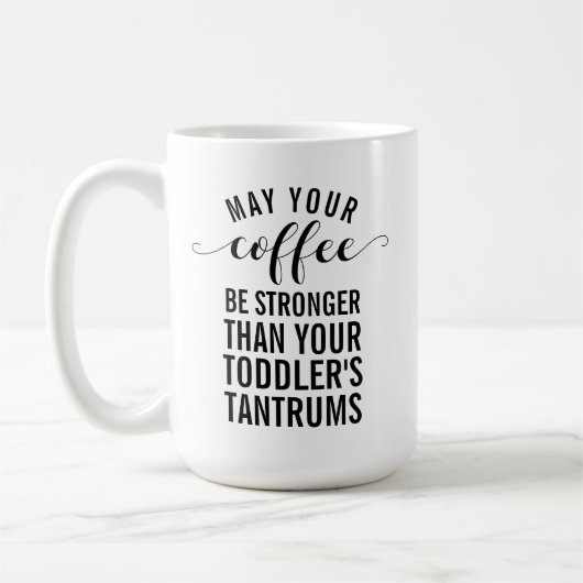 あなたのコーヒーがあなたの幼児より強くなることを願う コーヒーマグカップ (左)