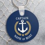 あなたのボート名キャプテンいかりローレルネイビーブルー キーホルダー<br><div class="desc">船パーソナライズされた名、家族の名前または他の希望の文字とキャプテンタイトルまたは必要に応じて他のランクを持つキーチェーン。ネイビーカスタムブルーに航海の金ゴールドスタイルのラウ葉ルいかりとスターのエンブレムを設計したテーマを備えているか、簡単に現在のボートに合わせて原色を調整できる。父の日素晴らし、母の日、誕生日または任意の大事な行事のための贈り物をする。</div>