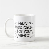 あなたの保護のために重く薬で治療されて コーヒーマグカップ (左)