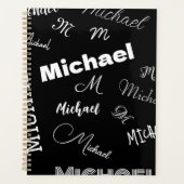 あなたの名前とモノグラムカスタムのパターン黒 プランナー手帳 (正面)