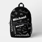 あなたの名前とモノグラムカスタムのパターン黒 プリントバックパック (正面)