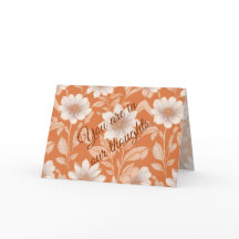 あなたは私たちの考えに入っている – オレンジに白い花