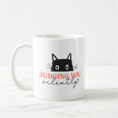 あなたを黙って見てるかわいい猫 コーヒーマグカップ (左)