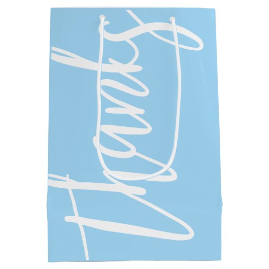 ありがとうのタイポグラフィの空色および白 ミディアムペーパーバッグ (裏面)