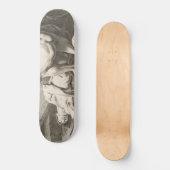 ある男が別の男の脚を持ち上げる スケートボード (正面)