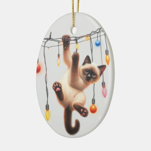 いたずらなシャム猫がクリスマスを定義する セラミックオーナメント (左)