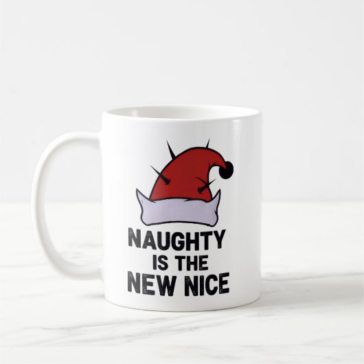 いたずら好きこそ最高の素敵、クリスマス反逆児エルフ コーヒーマグカップ (左)
