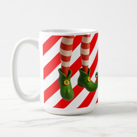 いたずら好きなエルフの足 クリスマスカード | ノースポールの悪戯 コーヒーマグカップ (左)