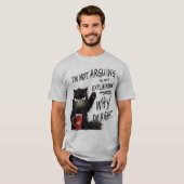 いたずら好きな黒猫のコーヒー愛好家のデザイン Tシャツ (正面フル)
