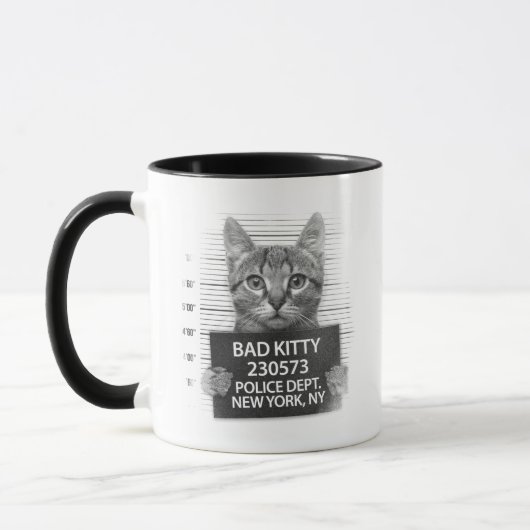 いたずら猫警察 逮捕写真 楽しいコーヒーマグ マグカップ (左)