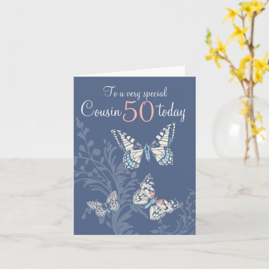 いとこの50歳の誕生日の蝶の青いサンゴ カード (黄色い花)