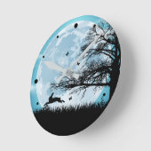 うさぎのシルエットが描かれた神秘的な月 ラウンド壁時計 (傾斜)