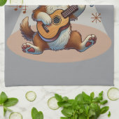 うちの犬はフリーズウクレレのチューニング曲を持っている キッチンタオル (折り畳み)