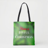うれしそうなクリスマスタイポグラフィに霜を降ろす トートバッグ (正面)
