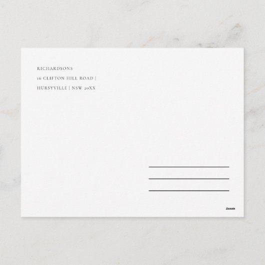 おしゃれなクリスマスのインテリア ポインセチアと暖炉 シーズンポストカード (裏面)