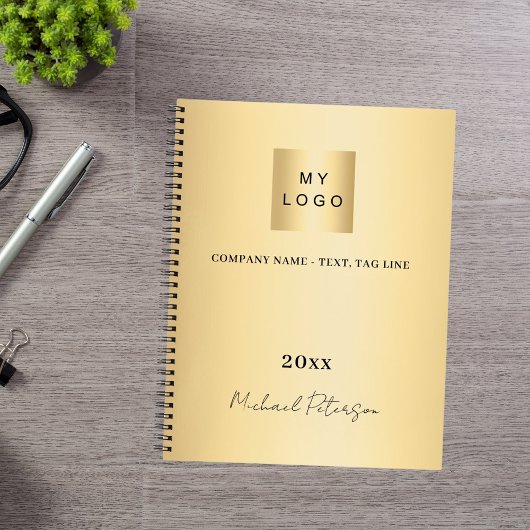おしゃれなゴールドの筆記体ロゴ ノートブック
