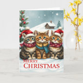 おしゃれな冬の装いと帽子を身に着けた猫たち クリスマス カード (黄色い花)