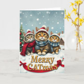 おしゃれな冬の装いと帽子を身に着けた猫たち クリスマス カード (黄色い花)