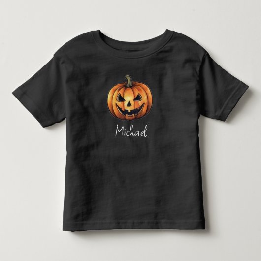 おしゃれな名前入りオレンジ色のカボチャ ハロウィン トドラーTシャツ (正面)