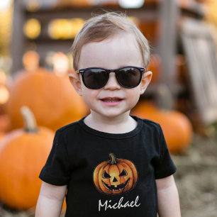 おしゃれな名前入りオレンジ色のカボチャ ハロウィン トドラーTシャツ
