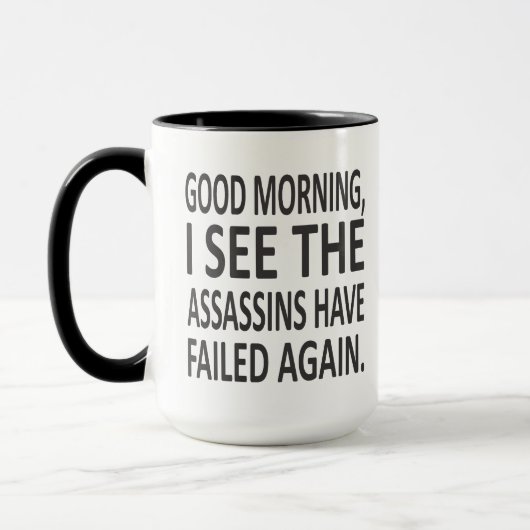 おはよう私は暗殺者が再度失敗するのを見ます マグカップ (左)