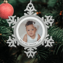 おめでたい赤ちゃんの初めてのクリスマスの写真