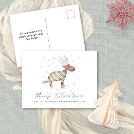 おもしろいかわいいスケートで滑るトナカイのメリークリスマス シーズンポストカード