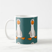 おもしろいで悲しいガチョウの漫画 コーヒーマグカップ (左)