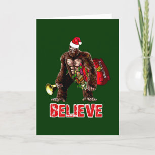 おもしろいなサスカッチのサンタクロースのクリスマスのデザイン シーズンカード