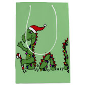 おもしろいなネス湖モンスターのクリスマスのギフトバッグ ミディアムペーパーバッグ (正面)