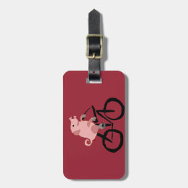 おもしろいなピンクのブタの乗馬の自転車 ラゲッジタグ