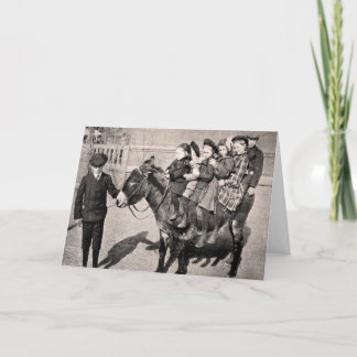 おもしろいなヴィンテージのポートレートの子供のろばのバランスをとること カード