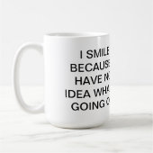 おもしろいな引用文の幸せなマグ コーヒーマグカップ (左)