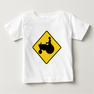 おもしろいな農場トラクターの交通標識の警告 ベビーTシャツ