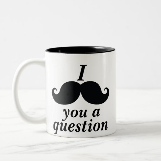 おもしろいなI mustache you a question ツートーンマグカップ (左)