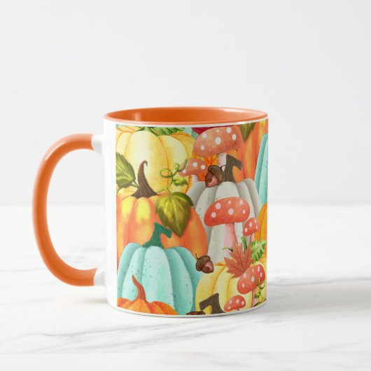 おもしろいカボチャのキノコと紅葉 マグカップ (左)