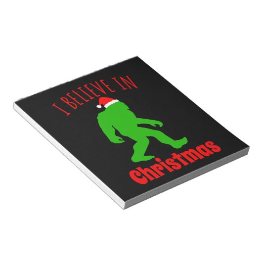 おもしろいクリスマスに信じBigfoot I ノートパッド (アングル)