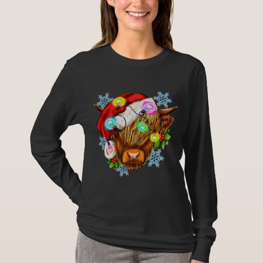 おもしろいクリスマス高地の牛、西クリスマス李 Tシャツ (正面)