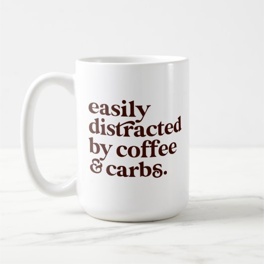 おもしろいコモダンーヒー好きカーブ好き茶色の文字 コーヒーマグカップ (左)