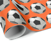 おもしろいサッカーボールのオレンジ色 ラッピングペーパー (ロールコーナー)