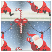 おもしろいサンタクロースが贈り物をキャンディーケイン ファブリック (クローズアップ)