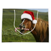 おもしろいサンタ帽をかぶったクリスマスの馬 ラージペーパーバッグ (正面)