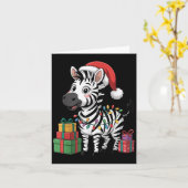 おもしろいシマウマのサンタ帽子が好きな動物の変なクリスマス カード (黄色い花)