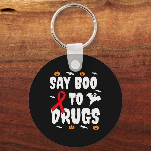 おもしろいハロウィーンギフトは麻薬にブーと言う認識度赤 キーホルダー (正面)