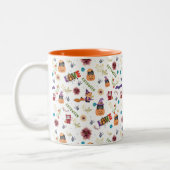 おもしろいパープルハットカトウィーン、かわいいオレンジカボチャ ツートーンマグカップ (左)