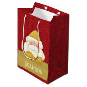 おもしろいレッド&金ゴールドサンタをテーマにした ミディアムペーパーバッグ (正面アングル)
