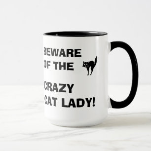 おもしろい熱狂するな猫の女性のMug用心して下さい マグカップ