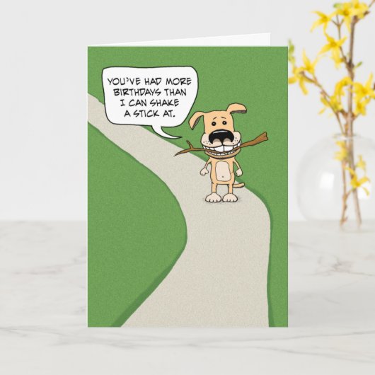 おもしろい犬とスティック誕生日 カード (黄色い花)